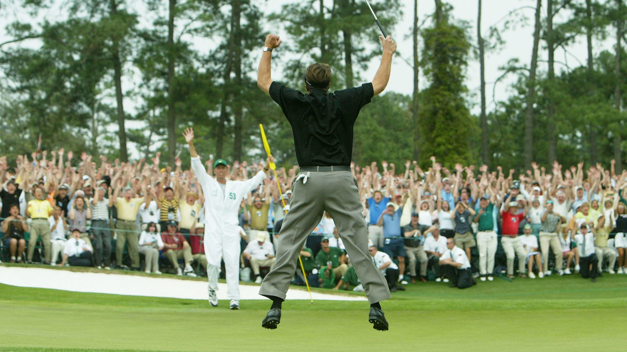 AUGUSTA, GA - APRIL 11: Phil Mickelson jumps in the air after making birdie on the 18th hole to win the Masters by one shot during the final round of the Masters at the Augusta National Golf Club on April 11, 2004 in Augusta, Georgia.