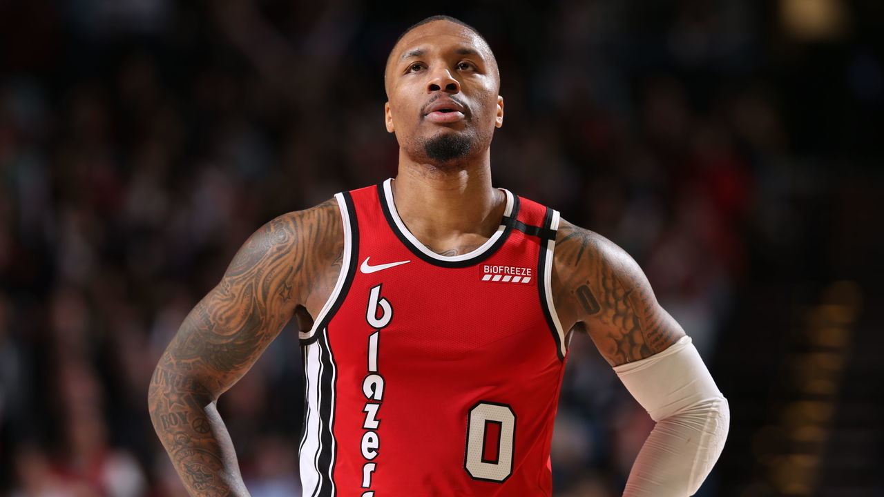 PORTLAND, OR - MARCH 10: Damian Lillard #0 of the Portland Trail Blazers looks on during the game on March 10 , 2020 at the Moda Center Arena in Portland, Oregon. Mandatory Copyright Notice: Copyright 2020 NBAE