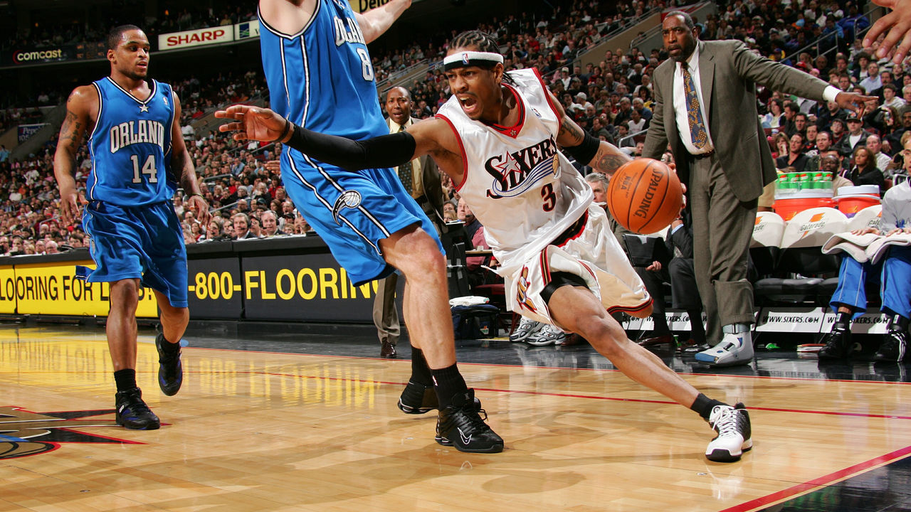 PHILADELPHIA - FEBRUARY 12: Allen Iverson #3 of the Philadelphia 76ers drives against Pat Garrity #8 of the Orlando Magic on February 12, 2005 at the Wachovia Center in Philadelphia, Pennsylvania. NOTE TO USER: User expressly acknowledges and agrees that, by downloading and or using this photograph, User is consenting to the terms and conditions of the Getty Images License Agreement. Mandatory Copyright Notice: Copyright 2005 NBAE