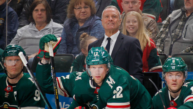 ST PAUL, MINNESOTA - FEBRUARY 15: Interim head coach Dean Evason, Mikko Koivu #9 Eric Staal #12 and Ryan Donato #6 of the Minnesota Wild watch play against the San Jose Sharks from the bench during the first period of the game on February 15, 2020 in St Paul, Minnesota.
