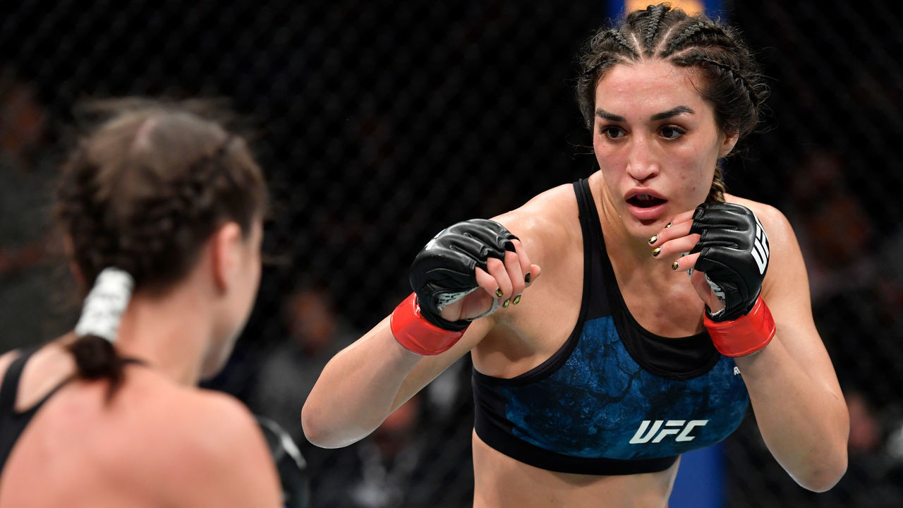 CHICAGO, IL - JUNE 08: Tatiana Suarez battles Nina Ansaroff in their women's strawweight bout during the UFC 238 event at the United Center on June 8, 2019 in Chicago, Illinois.
