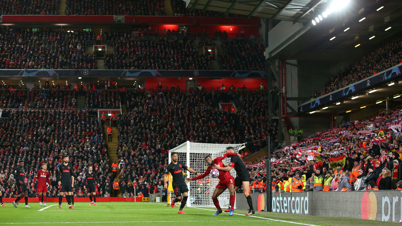 LIVERPOOL, ENGLAND - MARCH 11: Georginio Wijnaldum of Liverpool shields the ball from Koke of Atletico Madrid during the UEFA Champions League round of 16 second leg match between Liverpool FC and Atletico Madrid at Anfield on March 11, 2020 in Liverpool, United Kingdom.