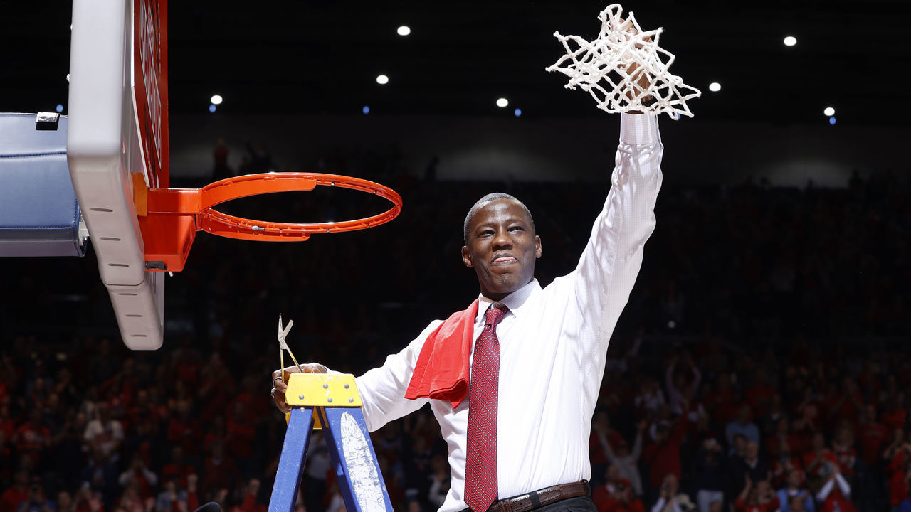 DAYTON, OH - MARCH 07: Dayton Flyers head coach Anthony Grant celebrates after cutting down the net following a game against the George Washington Colonials at UD Arena on March 7, 2020 in Dayton, Ohio.