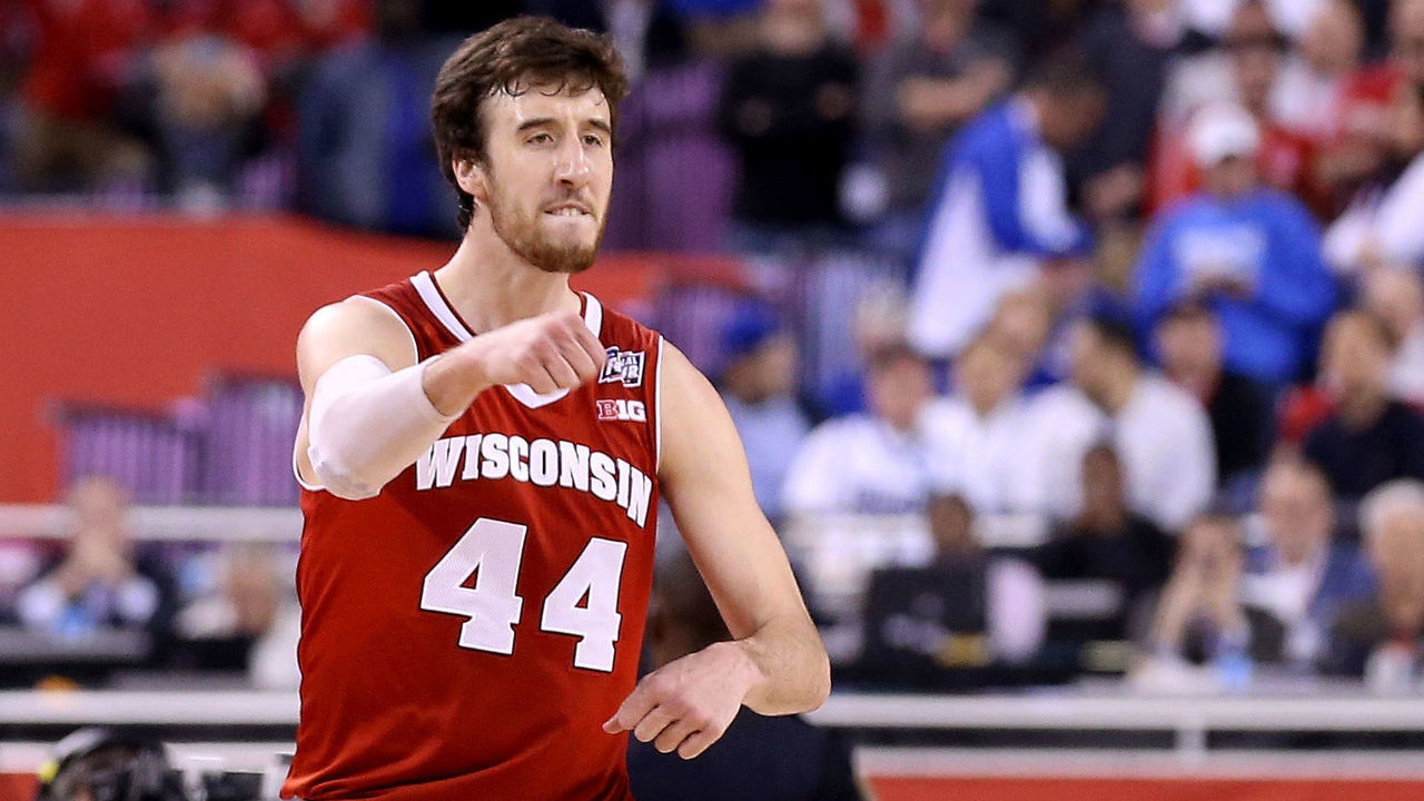 INDIANAPOLIS, IN - APRIL 04: Frank Kaminsky #44 of the Wisconsin Badgers celebrates late in the game against the Kentucky Wildcats during the NCAA Men's Final Four Semifinal at Lucas Oil Stadium on April 4, 2015 in Indianapolis, Indiana.