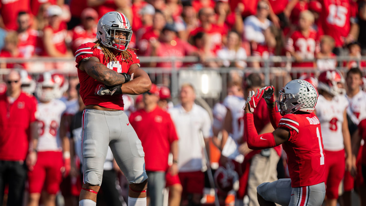 COLUMBUS, OH - SEPTEMBER 21: Jeff Okudah #1 of the Ohio State Buckeyes acts out taking a photo of Chase Young #2 of the Ohio State Buckeyes reacting to a play during game action between the Ohio State Buckeyes and the Miami Redhawks on September 21, 2019, at Ohio Stadium in Columbus, OH.