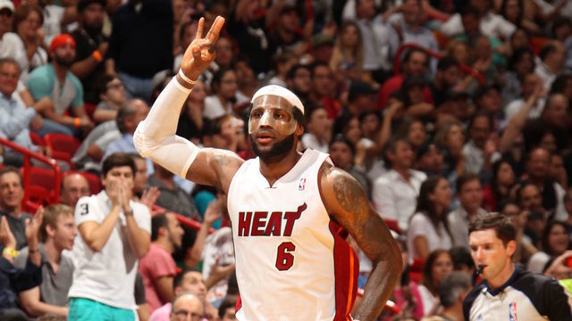 MIAMI, FL - March 3: LeBron James #6 of the Miami Heat runs up court and celebrates against the Charlotte Bobcats at the American Airlines Arena in Miami, Florida on Mar. 3, 2014. NOTE TO USER: User expressly acknowledges and agrees that, by downloading and/or using this photograph, user is consenting to the terms and conditions of the Getty Images License Agreement. Mandatory copyright notice: Copyright NBAE 2014