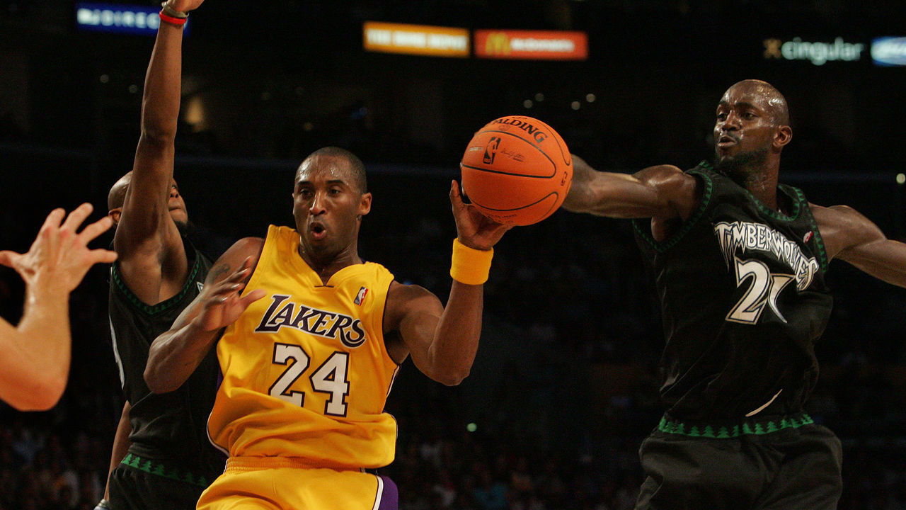 Los Angeles Lakers Kobe Bryant losses control of the ball after Minnesota Timberwolves Kevin Garnett,right, knocks ball away during first quarter action at Staples Center, Tuesday November 7, 2006.
