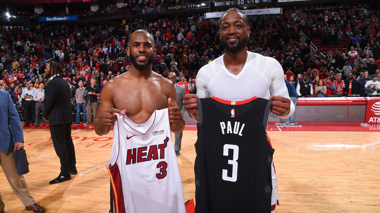 HOUSTON, TX - FEBRUARY 28 : Chris Paul #3 of the Houston Rockets and Dwyane Wade #3 of the Miami Heat pose for a photo after exchanging jerseys on February 28, 2019 at the Toyota Center in Houston, Texas. Mandatory Copyright Notice: Copyright 2019 NBAE