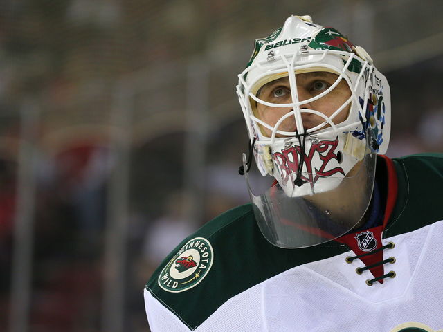 PHOTO: Wild's Bryzgalov poses for selfies with fans during preseason game
