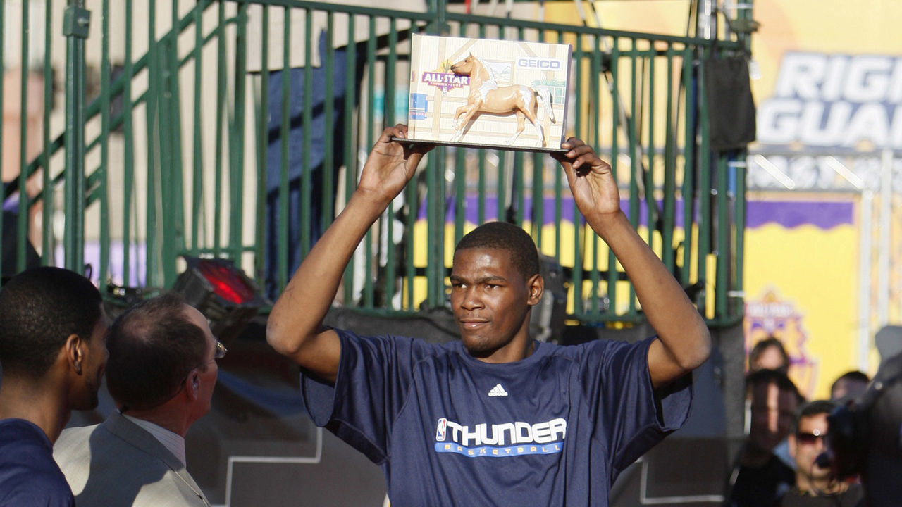PHOENIX - FEBRUARY 14: Kevin Durant of the Oklahoma City Thunder holds up the trophy after winning at the HORSE competition at the All Star Block Party presented by Right Guard during NBA All Star Weekend on February 14, 2009 in Phoenix, Arizona. Mandatory Copyright Notice: Copyright 2009 NBAE.