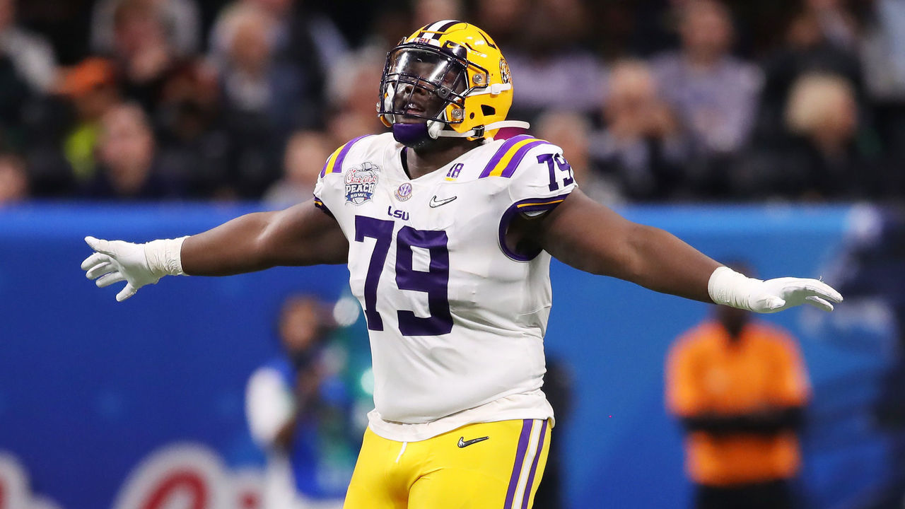 ATLANTA, GEORGIA - DECEMBER 28: Center Lloyd Cushenberry III #79 of the LSU Tigers celebrates during the game against the Oklahoma Sooners in the Chick-fil-A Peach Bowl at Mercedes-Benz Stadium on December 28, 2019 in Atlanta, Georgia.