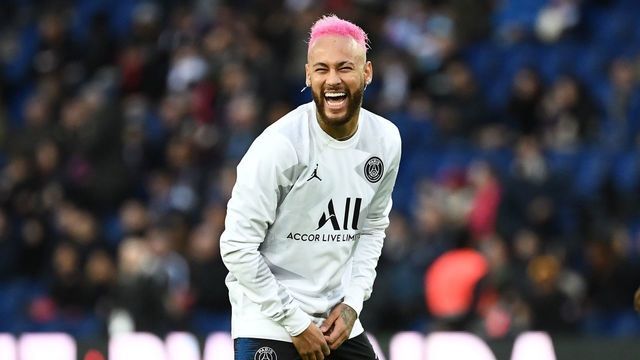Paris Saint-Germain's Brazilian forward Neymar laughs during warm up prior to the French L1 football match between Paris Saint-Germain (PSG) and Montpellier Herault SC at the Parc des Princes stadium in Paris, on February 1, 2020.