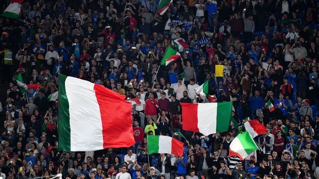 Italy's supporters wave Italian National flags during the UEFA Euro 2020 Group J qualifier football match between Italy and Greece at the Stadio Olimpico stadium in Rome, on October 12, 2019.