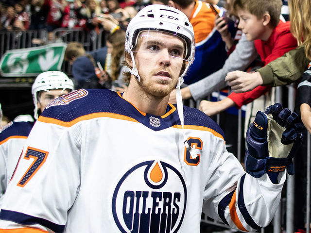 COLOGNE, GERMANY - OCTOBER 03: Connor McDavid of Edmonton shakes hands with the fans prior to the NHL Global Series Challenge game between Edmonton Oilers and Kolner Haie at Lanxess Arena on October 3, 2018 in Cologne, Germany.