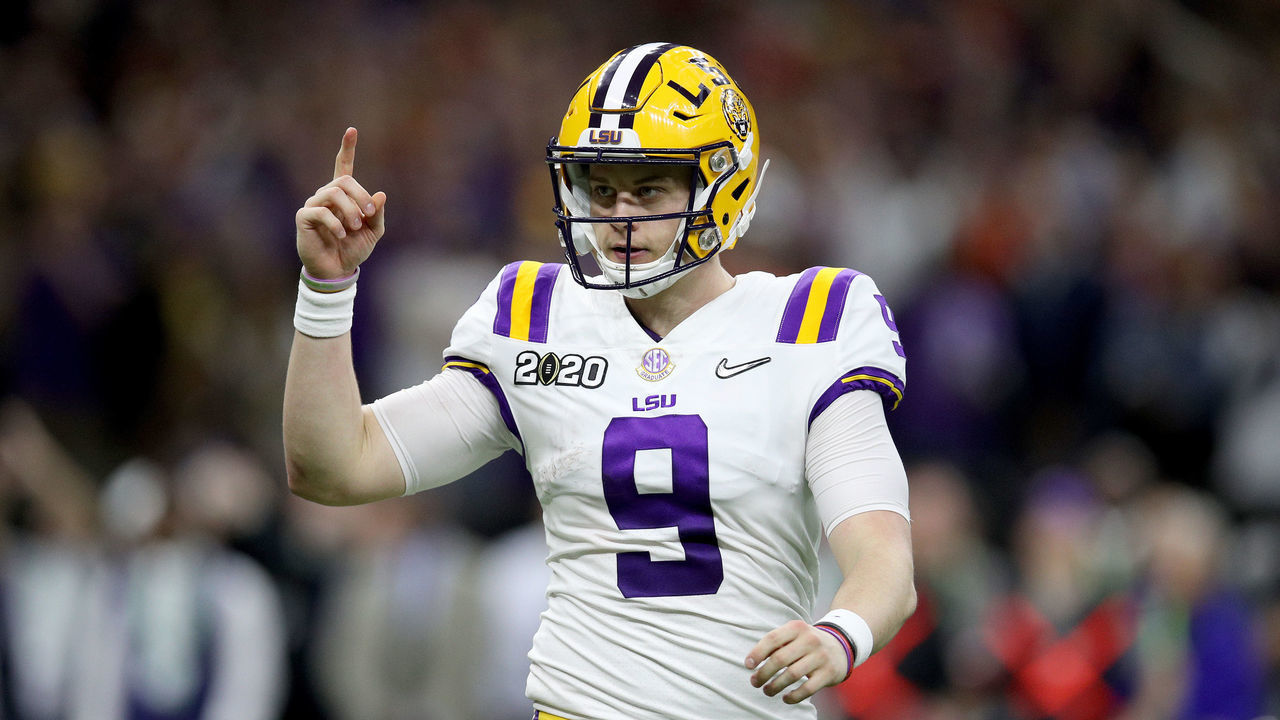 NEW ORLEANS, LOUISIANA - JANUARY 13: Joe Burrow #9 of the LSU Tigers reacts to a touchdown against Clemson Tigers during the third quarter in the College Football Playoff National Championship game at Mercedes Benz Superdome on January 13, 2020 in New Orleans, Louisiana.