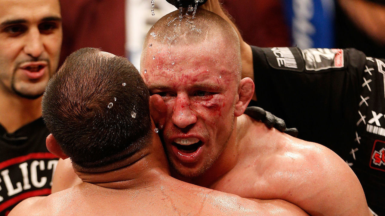 LAS VEGAS, NV - NOVEMBER 16: (R-L) Georges St-Pierre congratulates Johny Hendricks after their UFC welterweight championship bout during the UFC 167 event inside the MGM Grand Garden Arena on November 16, 2013 in Las Vegas, Nevada.