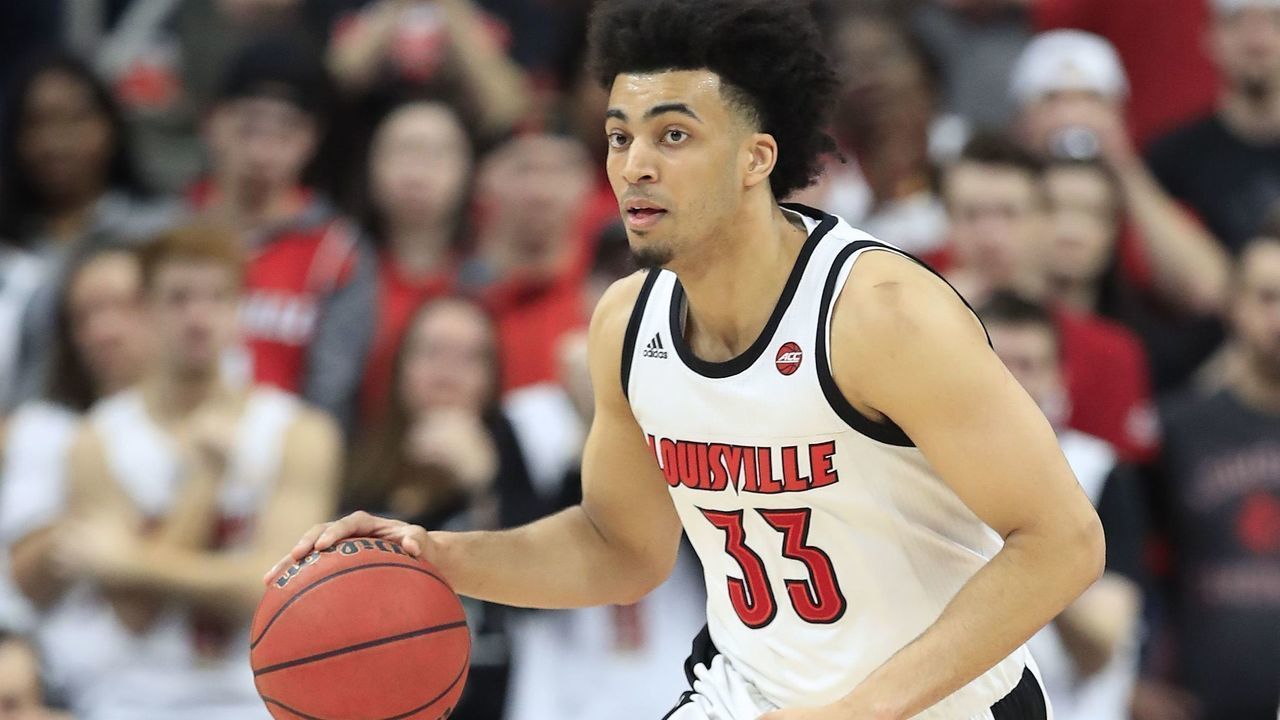 LOUISVILLE, KENTUCKY - FEBRUARY 22: Jordan Nwora #33 of the Louisville Cardinals dribbles the ball against the North Carolina Tar Heels at KFC YUM! Center on February 22, 2020 in Louisville, Kentucky.