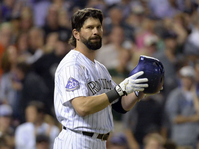 DENVER, CO. - SEPTEMBER 25: Todd Helton (17) of the Colorado Rockies stands in the on deck circle as he waits for his at bat agains the Boston Red Sox September 25, 2013 at Coors Field.