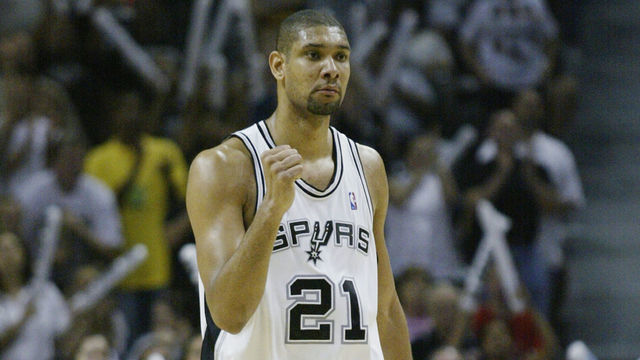 SAN ANTONIO, TX - JUNE 15: Tim Duncan #21 of the San Antonio Spurs celebrates in Game six of the 2003 NBA Finals against the New Jersey Nets on June 15, 2003 at the SBC Center in San Antonio, Texas. The Spurs won 88-77 and defeated the Nets to win the NBA Championship. NOTE TO USER: User expressly acknowledges and agrees that, by downloading and/or using this Photograph, User is consenting to the terms and conditions of the Getty Images License Agreement.