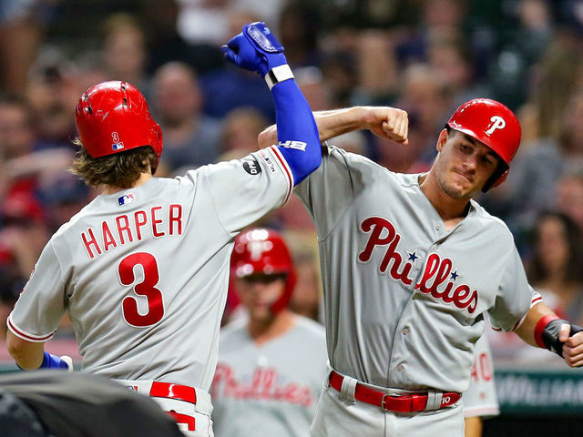 CLEVELAND, OH - SEPTEMBER 21: Philadelphia Phillies right fielder Bryce Harper (3) and Philadelphia Phillies catcher J.T. Realmuto (10) celebrate after Harper hit a 3-run home run during the fifth inning of the Major League Baseball interleague game between the Philidelphia Phillies and Cleveland Indians on September 21, 2019, at Progressive Field in Cleveland, OH.