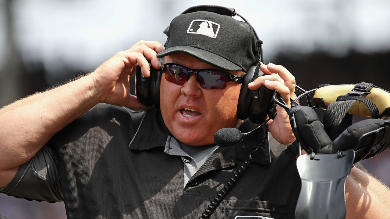 CHICAGO, IL - JULY 05: Home plate umpire and crew chief Fieldin Culbreth #25 waits for a replay ruling during a game bwteen the Chicago Cubs and the Tampa Bay Rays at Wrigley Field on July 5, 2017 in Chicago, Illinois.