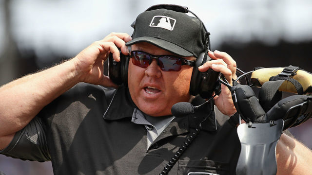 CHICAGO, IL - JULY 05: Home plate umpire and crew chief Fieldin Culbreth #25 waits for a replay ruling during a game bwteen the Chicago Cubs and the Tampa Bay Rays at Wrigley Field on July 5, 2017 in Chicago, Illinois.