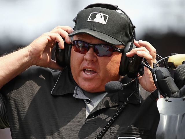 CHICAGO, IL - JULY 05: Home plate umpire and crew chief Fieldin Culbreth #25 waits for a replay ruling during a game bwteen the Chicago Cubs and the Tampa Bay Rays at Wrigley Field on July 5, 2017 in Chicago, Illinois.