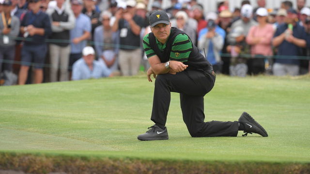 VICTORIA , AUSTRALIA - DECEMBER 15: International Team Captains Assistant Trevor Immelman of South Africa watches the action during the final round singles matches at the Presidents Cup at The Royal Melbourne Golf Club on December 15, 2019, in Victoria , Australia.