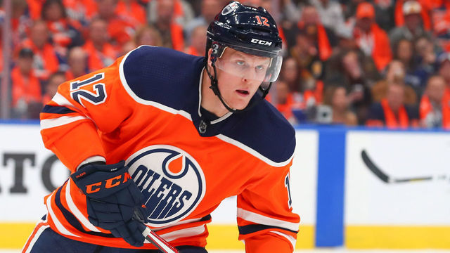 EDMONTON, AB - OCTOBER 02: Edmonton Oilers Center Colby Cave (12) defends his own zone in the first period during the Edmonton Oilers game versus the Vancouver Canucks on October 2, 2019 at Rogers Place in Edmonton, AB.