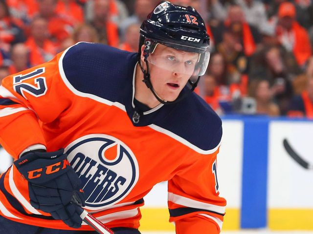 EDMONTON, AB - OCTOBER 02: Edmonton Oilers Center Colby Cave (12) defends his own zone in the first period during the Edmonton Oilers game versus the Vancouver Canucks on October 2, 2019 at Rogers Place in Edmonton, AB.