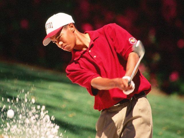 Tiger Woods Hits A Bunker Shot During The 1995 Masters Tournament