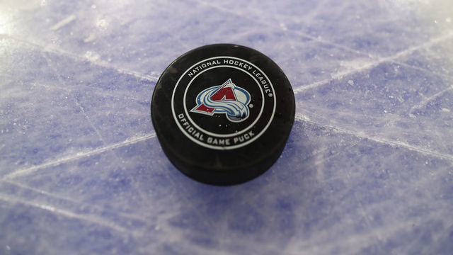 DENVER, CO - JANUARY 4: An official game puck sits on the ice prior to the Colorado Avalanche against the New York Rangers at the Pepsi Center on January 4, 2019 in Denver, Colorado. The Avalanche defeated the Rangers 6-1.