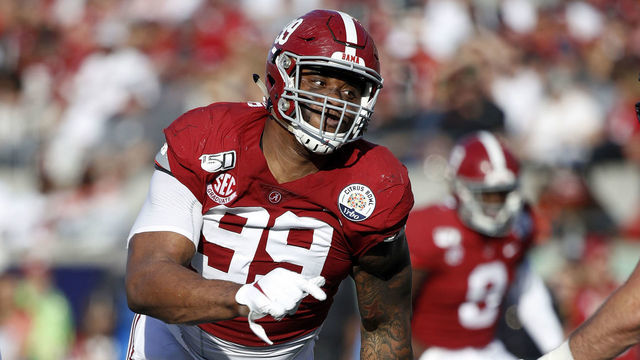 ORLANDO, FL - JANUARY 01: Raekwon Davis #99 of the Alabama Crimson Tide in action on defense during the Vrbo Citrus Bowl against the Michigan Wolverines at Camping World Stadium on January 1, 2020 in Orlando, Florida. Alabama defeated Michigan 35-16.