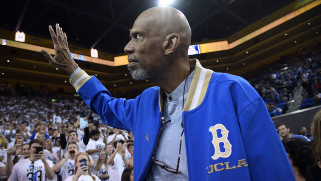 LOS ANGELES, CA - JANUARY 21: Kareem Abdul-Jabbar waves to fans as he arrive to attend the UCLA Bruins and Arizona Wildcats college basketball game at Pauley Pavilion on January 21, 2017 in Los Angeles, California. Abdul-Jabbar was honored at half-time after recently receiving the Presidential Medal of Freedom, from President Barack Obama.