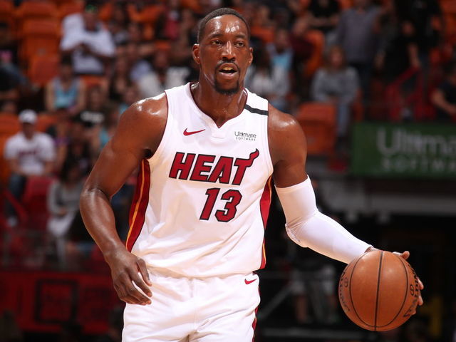 MIAMI, FL - MARCH 11: Bam Adebayo #13 of the Miami Heat handles the ball against the Charlotte Hornets on March 11, 2020 at American Airlines Arena in Miami, Florida. Mandatory Copyright Notice: Copyright 2020 NBAE