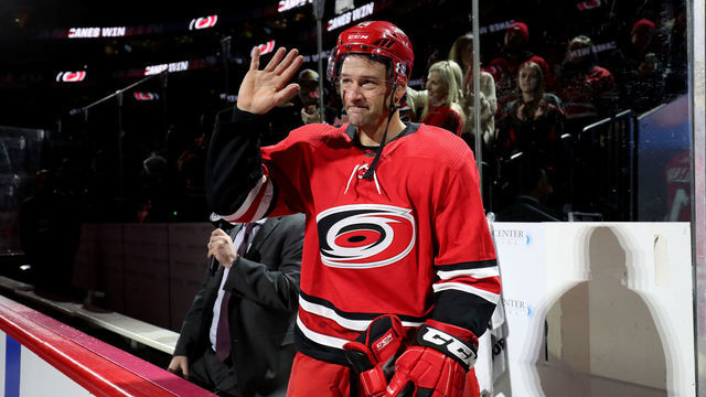 RALEIGH, NC - JANUARY 21: Justin Williams #14 of the Carolina Hurricanes is named 1st star of the game and waves to fans after a victory over the Winnipeg Jets on January 21, 2020 at PNC Arena in Raleigh, North Carolina.