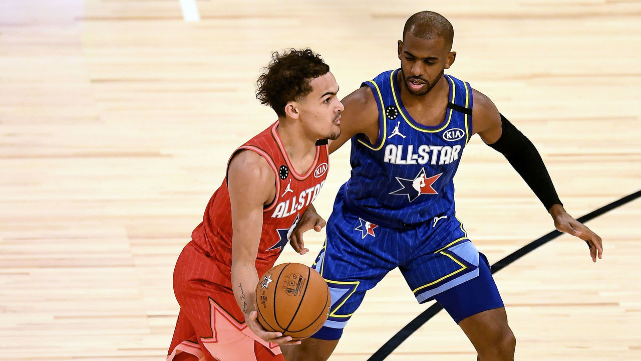 CHICAGO, ILLINOIS - FEBRUARY 16: Trae Young #24 of Team Giannis dribbles the ball while being guarded by Chris Paul #2 of Team LeBron in the fourth quarter during the 69th NBA All-Star Game at the United Center on February 16, 2020 in Chicago, Illinois.