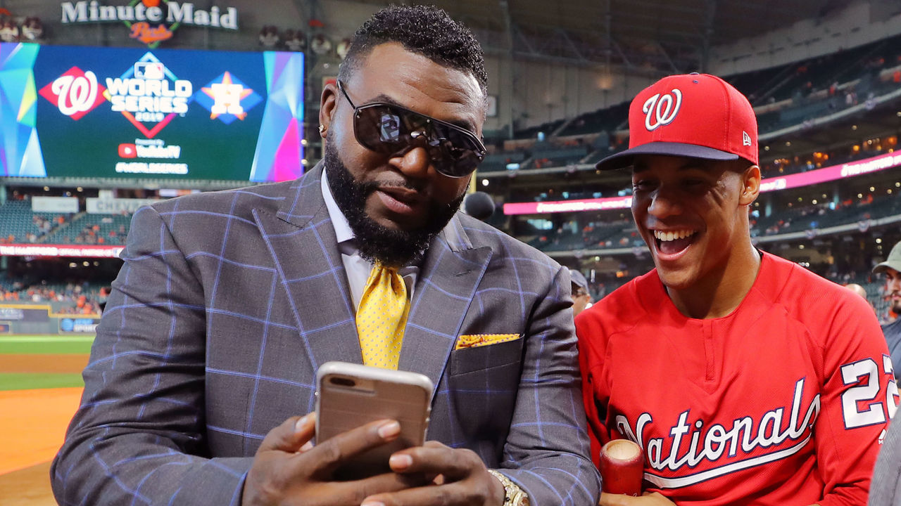 HOUSTON, TX - OCTOBER 23: Juan Soto #22 of the Washington Nationals jokes with former Major League Baseball players and FOX analysts David Ortiz and Alex Rodriguez during Game 2 of the 2019 World Series between the Washington Nationals and the Houston Astros at Minute Maid Park on Wednesday, October 23, 2019 in Houston, Texas.