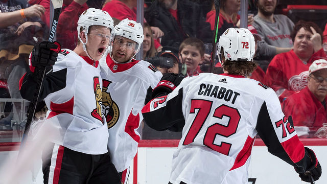 DETROIT, MI - FEBRUARY 14: Brady Tkachuk #7 of the Ottawa Senators celebrates his first period goal with teammates Colin White #36 and Thomas Chabot #72 during an NHL game against the Detroit Red Wings at Little Caesars Arena on February 14, 2019 in Detroit, Michigan.