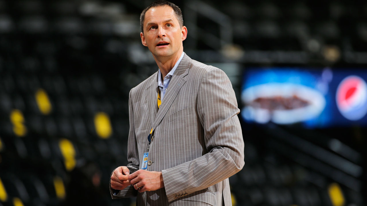 DENVER, CO - NOVEMBER 03: Arturas Karnisovas, assistant general manager of the Denver Nuggets watches as players warm up prior tto the game between the Sacramento Kings and the Denver Nuggets at Pepsi Center on November 3, 2014 in Denver, Colorado. The Kings defeated the Nuggets 110-105.