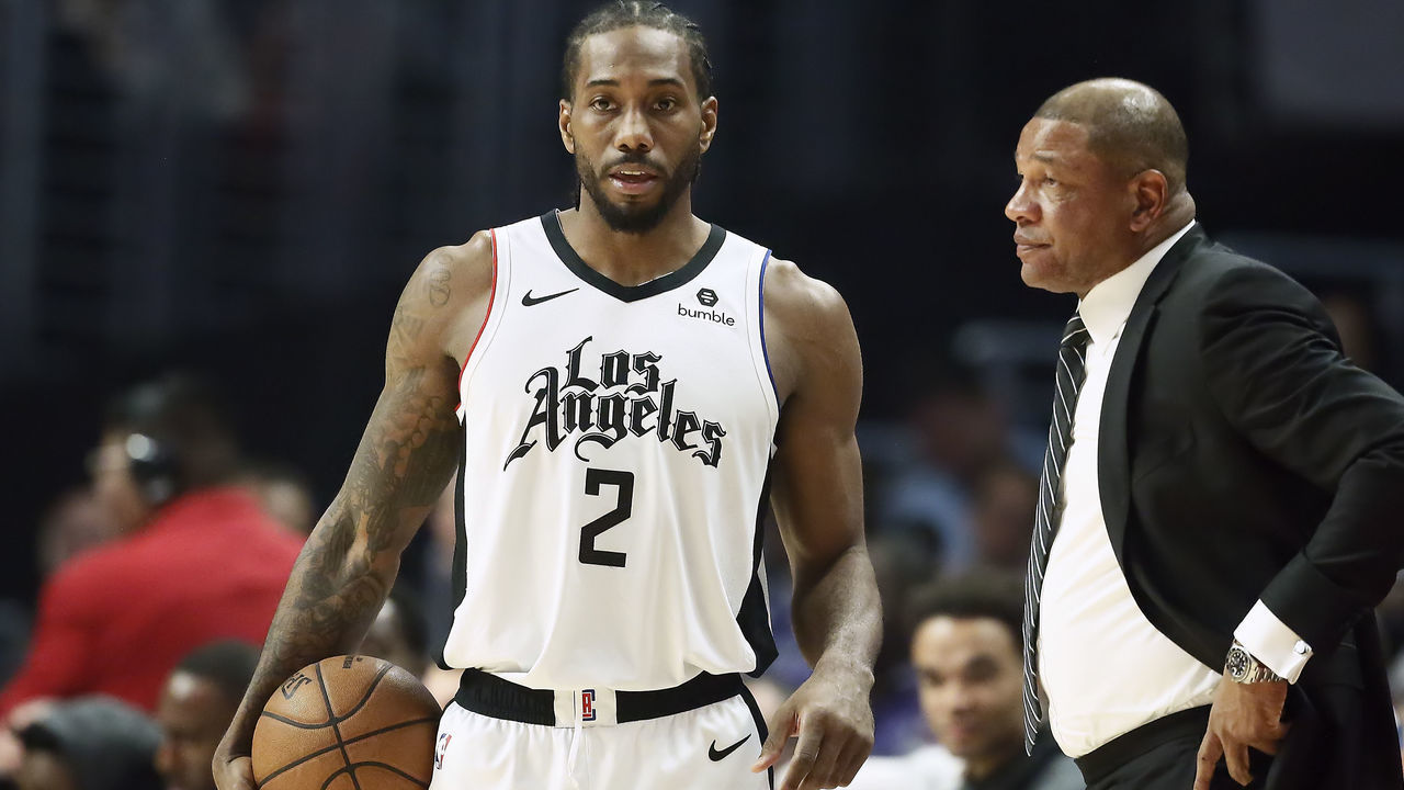 LOS ANGELES, CA - DECEMBER 19: Kawhi Leonard #2 of the LA Clippers talks with Head Coach Doc Rivers of the LA Clippers during the game against the Houston Rockets on December 19, 2019 at STAPLES Center in Los Angeles, California. NOTE TO USER: User expressly acknowledges and agrees that, by downloading and/or using this Photograph, user is consenting to the terms and conditions of the Getty Images License Agreement. Mandatory Copyright Notice: Copyright 2019 NBAE