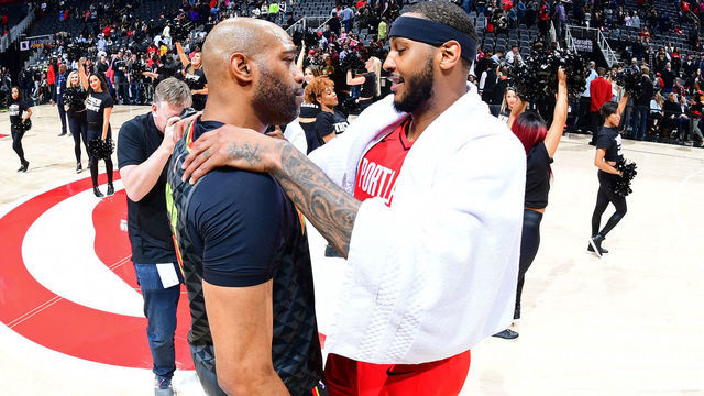 ATLANTA, GA - FEBRUARY 29: Vince Carter #15 of the Atlanta Hawks shares a conversation with Carmelo Anthony #00 of the Portland Trail Blazers after the game on February 29, 2020 at State Farm Arena in Atlanta, Georgia. NOTE TO USER: User expressly acknowledges and agrees that, by downloading and/or using this Photograph, user is consenting to the terms and conditions of the Getty Images License Agreement. Mandatory Copyright Notice: Copyright 2020 NBAE