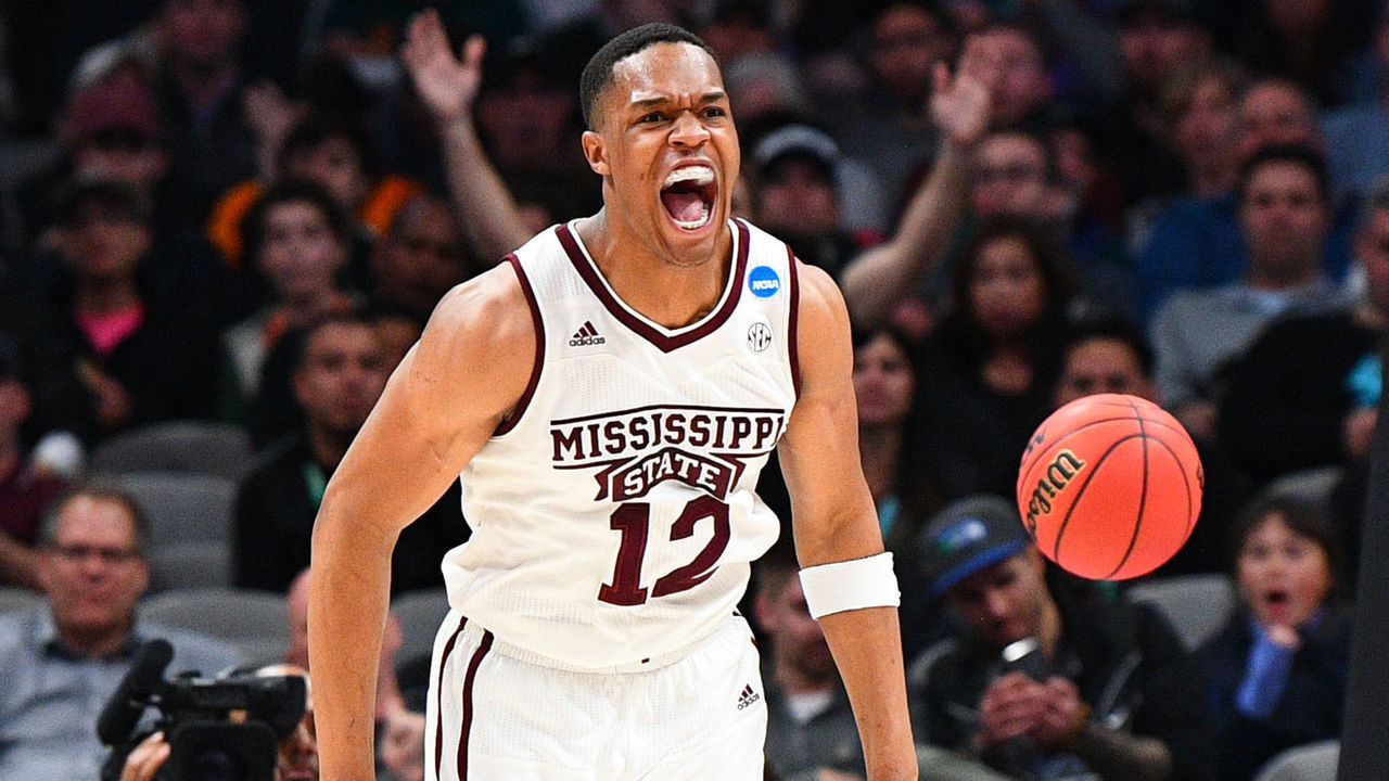 SAN JOSE, CA - MARCH 22: Mississippi State guard Robert Woodard II (12) reacts after a dunk during the game between the Mississippi State Bulldogs and the Liberty Flames in their NCAA Division I Men's Basketball Championship first round game on March 22, 2019, at SAP Center at San Jose in San Jose, CA.