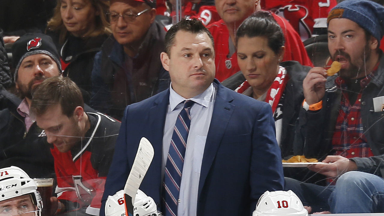 NEWARK, NJ - NOVEMBER 13: Head Coach D. J. Smith of the Ottawa Senators looks on from behind the bench during the game against the New Jersey Devils at the Prudential Center on November 13, 2019 in Newark, New Jersey.