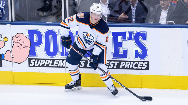 TORONTO, ON - FEBRUARY 27: Edmonton Oilers Center Colby Cave (12) skates with the puck during the NHL regular season game between the Edmonton Oilers and the Toronto Maple Leafs on February 27, 2019, at Scotiabank Arena in Toronto, ON, Canada.