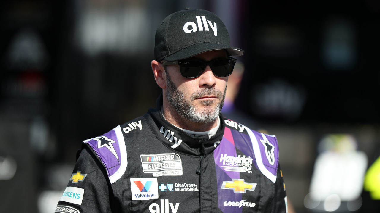 AVONDALE, ARIZONA - MARCH 06: Jimmie Johnson, driver of the #48 Ally Chevrolet, stands in the garage area during practice for the NASCAR Cup Series FanShield 500 at Phoenix Raceway on March 06, 2020 in Avondale, Arizona.