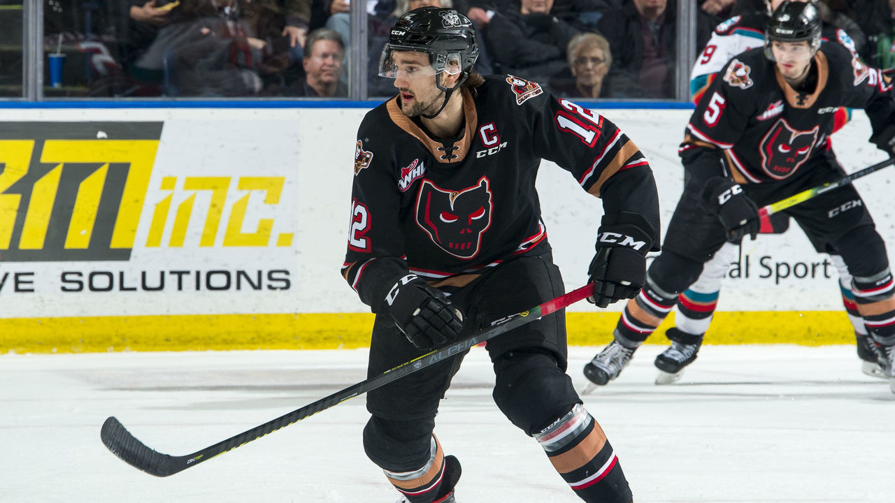 KELOWNA, BC - FEBRUARY 17: Mark Kastelic #12 of the Calgary Hitmen skates against the Kelowna Rockets during first period at Prospera Place on February 17, 2020 in Kelowna, Canada. Kastelic was selected in the 2019 NHL entry draft by the Ottawa Senators.