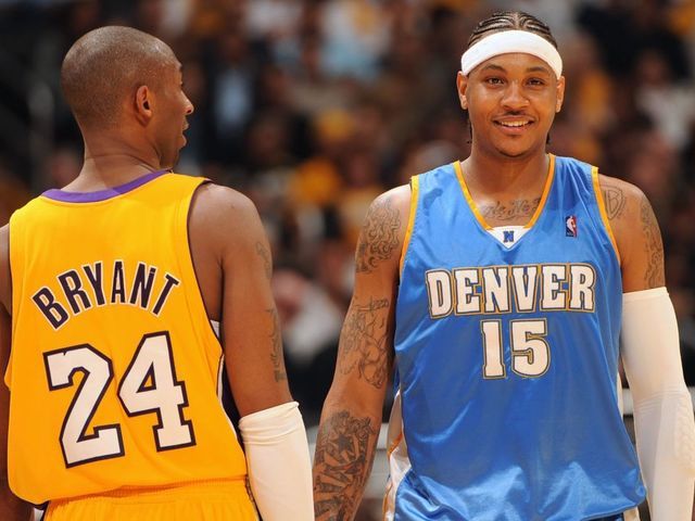 LOS ANGELES - APRIL 23: Kobe Bryant #15 of the Los Angeles Lakers chats with Carmelo Anthony #15 of the Denver Nuggets in Game Two of the Western Conference Quarterfinals during the 2008 NBA Playoffs at Staples Center on April 23, 2008 in Los Angeles, California. The Lakers won 122-107. NOTE TO USER: User expressly acknowledges and agrees that, by downloading and/or using this Photograph, user is consenting to the terms and conditions of the Getty Images License Agreement. Mandatory Copyright Notice: Copyright 2008 NBAE