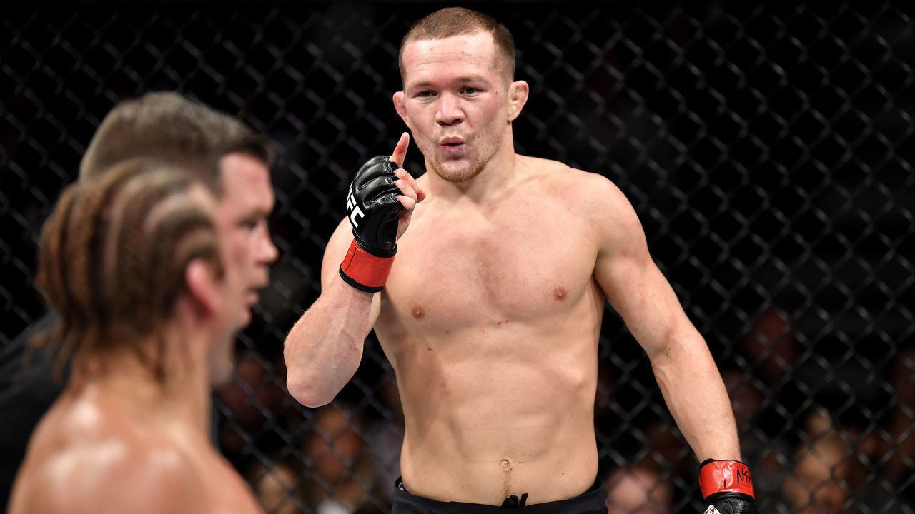 LAS VEGAS, NEVADA - DECEMBER 14: Petr Yan of Russia taunts Urijah Faber in their bantamweight bout during the UFC 245 event at T-Mobile Arena on December 14, 2019 in Las Vegas, Nevada.