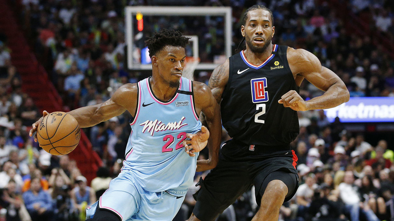 MIAMI, FLORIDA - JANUARY 24: Jimmy Butler #22 of the Miami Heat drives to the basket against Kawhi Leonard #2 of the LA Clippers during the second half at American Airlines Arena on January 24, 2020 in Miami, Florida. NOTE TO USER: User expressly acknowledges and agrees that, by downloading and/or using this photograph, user is consenting to the terms and conditions of the Getty Images License Agreement.